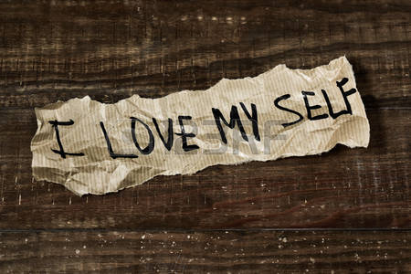 57434247-the-text-i-love-myself-written-in-a-piece-of-paper-placed-on-a-rustic-wooden-surface